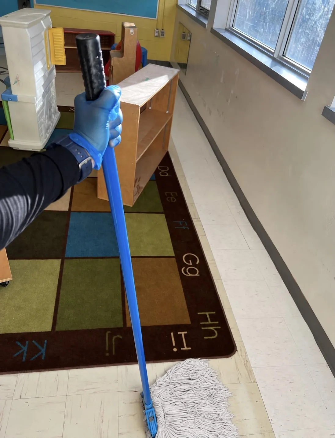 Mopping a daycare classroom